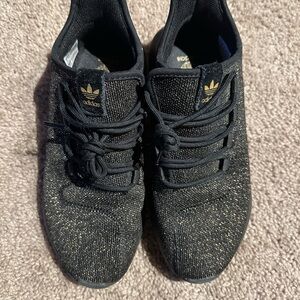 Adidas Black Sneakers with Gold Highlights